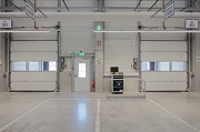 ebm-papst: inside logistic-center, loading-ramp sectional-gate, landscape