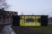 glass-cladded textile-concrete pavillon: Southern view at dusk