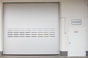 Novoferm tormatic: outer rolling gate with esacape-door