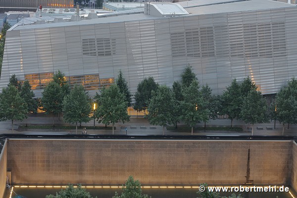 9/11 museum: elevated southern view at dusk with southern memorial-pool, zoomed