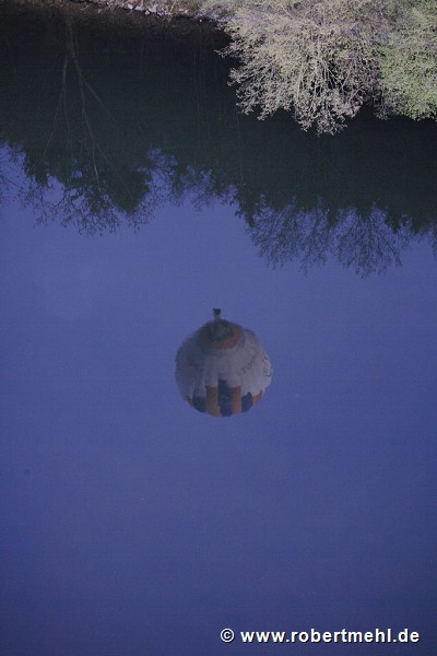 balloon water-reflection with river-bank