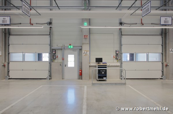 ebm-papst: inside logistic-center, loading-ramp sectional-gate, landscape