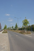 New railway town of Opladen: Europaallee in the west area with noise barrier