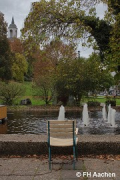 WärmKomp: fountain with steel chair and church tower (photo: Sari)